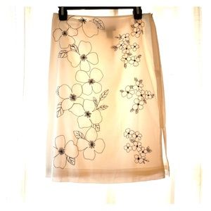 White skirt with pretty black design.